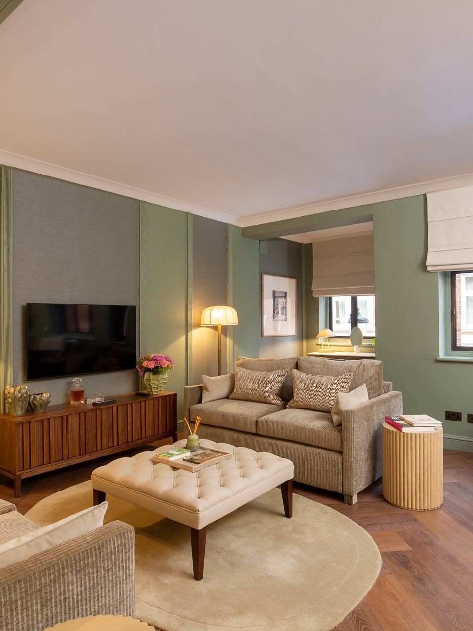 Elegant living room in a two-bedroom apartment at The Capital Hotel, Apartments & Townhouse