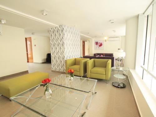 Interior of Lobby with lounges at Torremayor Providencia