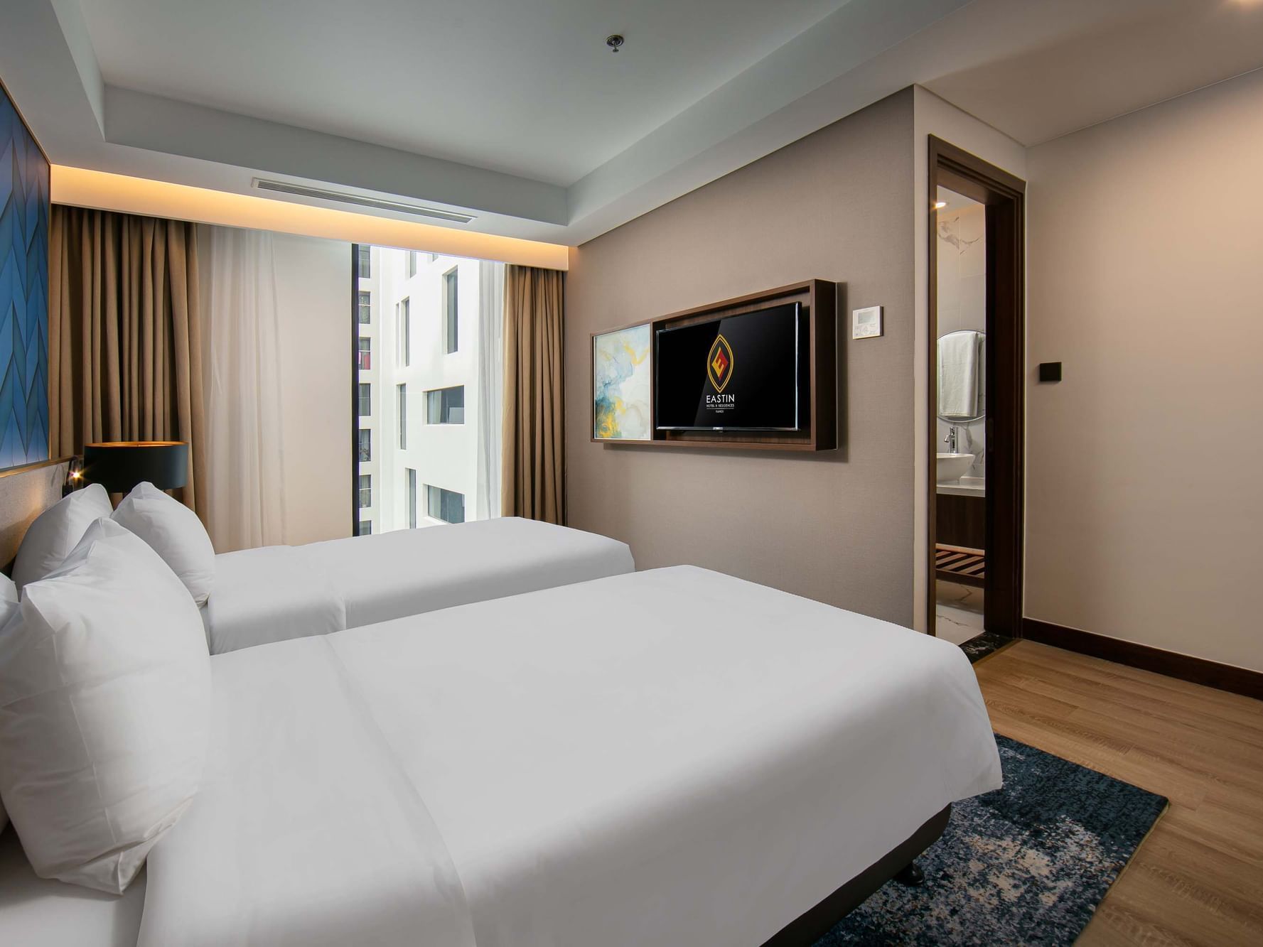 Two beds in Superior Room at Eastin Hotels