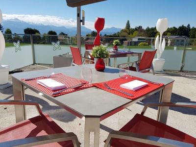 Outdoor dining area arranged at Starling Hotel Lausanne