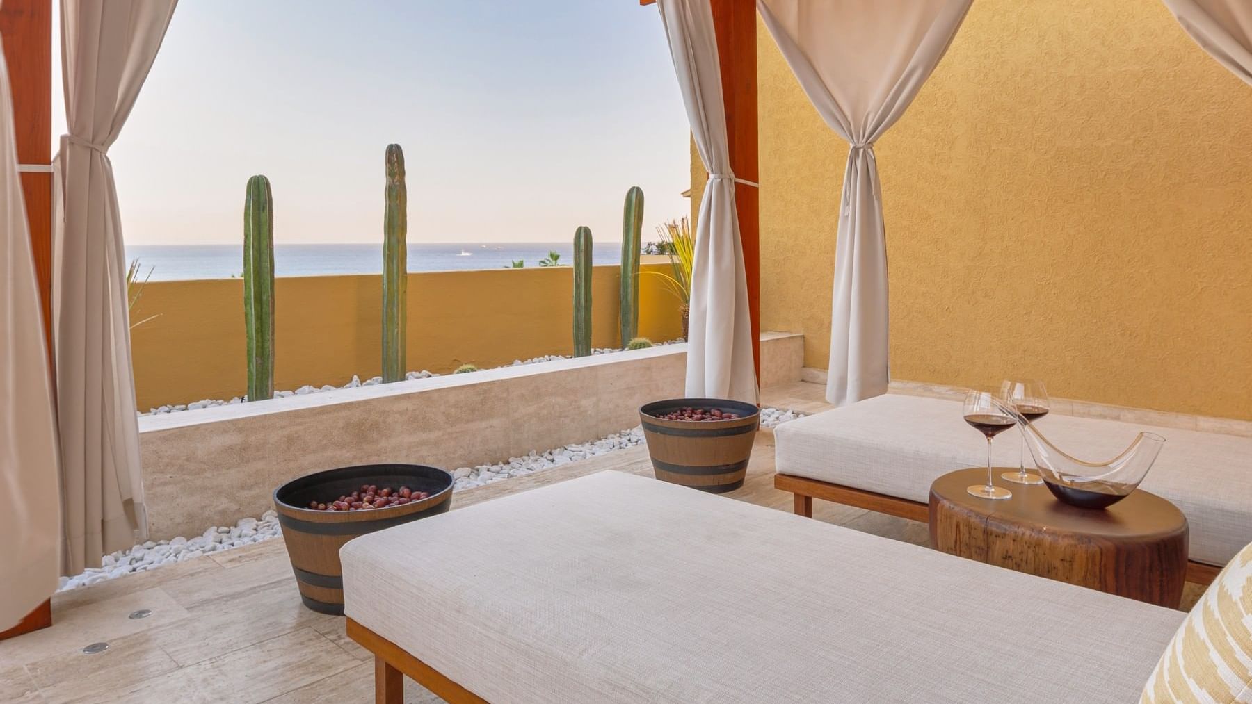 Outdoor massage cabin with spa beds & ocean view at Grand Fiesta Americana