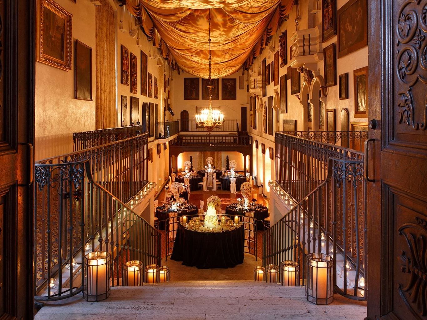 staircase to ballroom with tables
