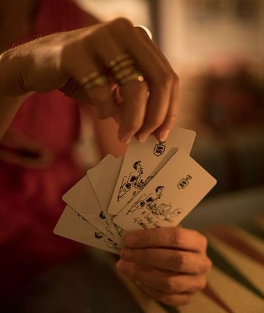 Closeup of guests Playing card games at Marbella Club