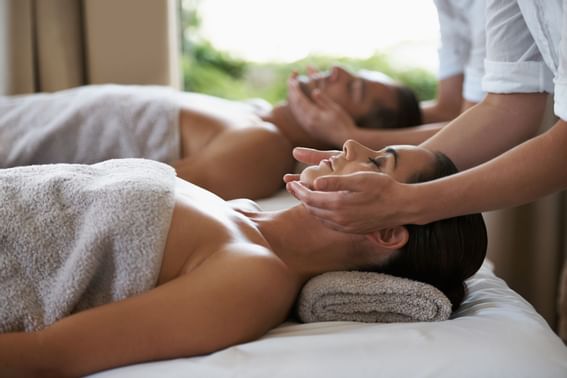 A couple receiving treatments in the spa at Sunseeker Resort