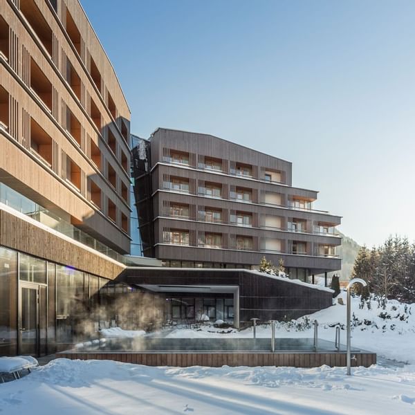 Hotel exterior & outdoor pool at Falkensteiner Hotel Schladming