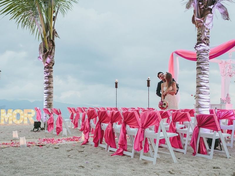 A wedded couple in their outdoor ceremony at FA Puerto Vallarta