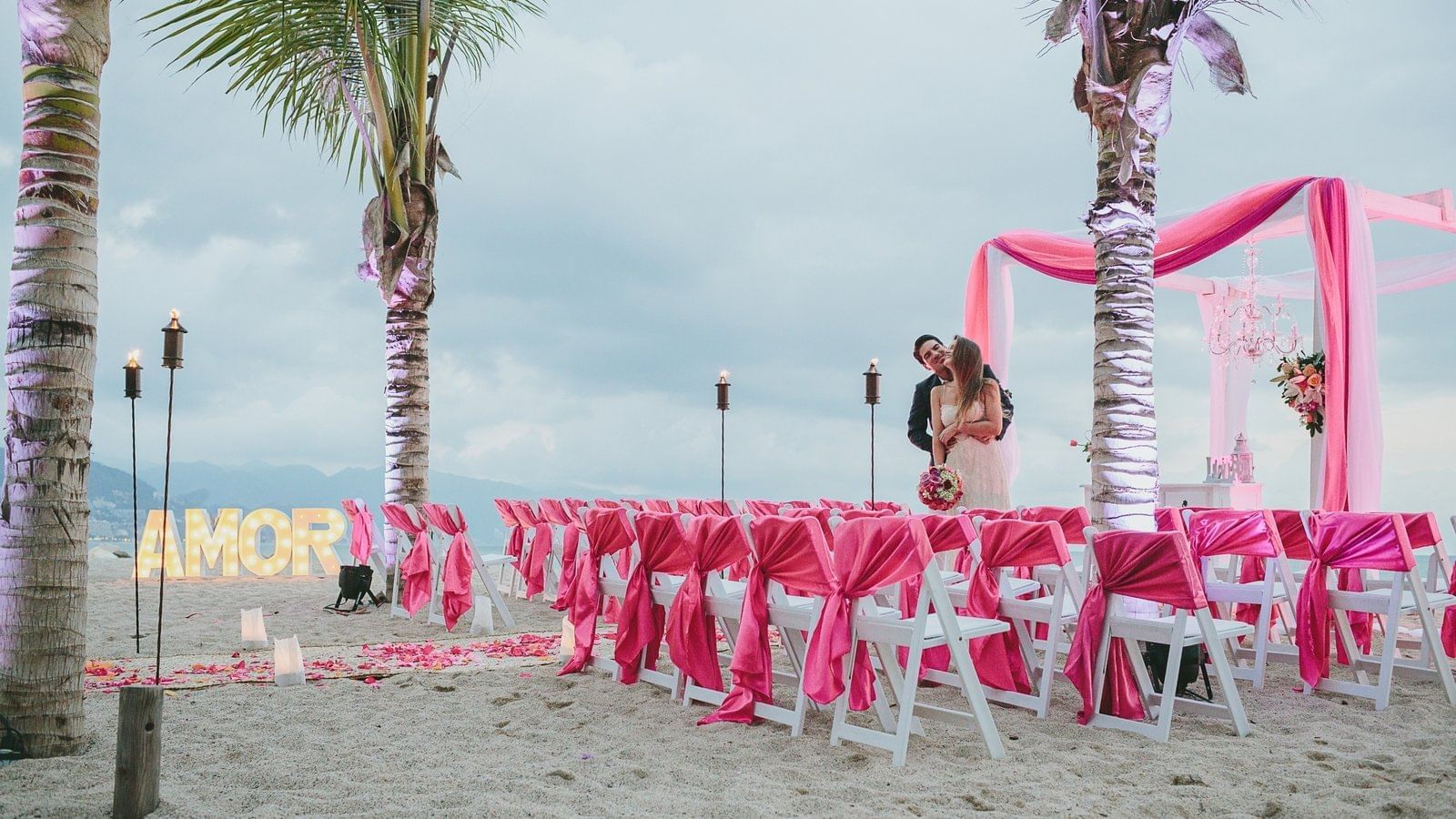 A wedded couple in their outdoor ceremony at FA Puerto Vallarta