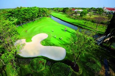 Aerial view of golf course & lake at Eastin Thana City Golf Resort Bangkok