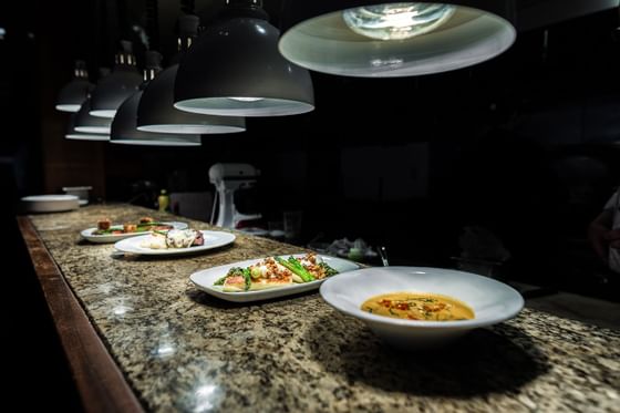 A variety of dishes served on a table at Poets Cove Resort & Spa