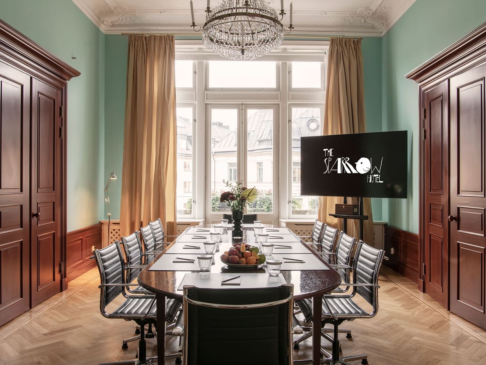 Conference table arranged in Edith room at The Sparrow Hotel