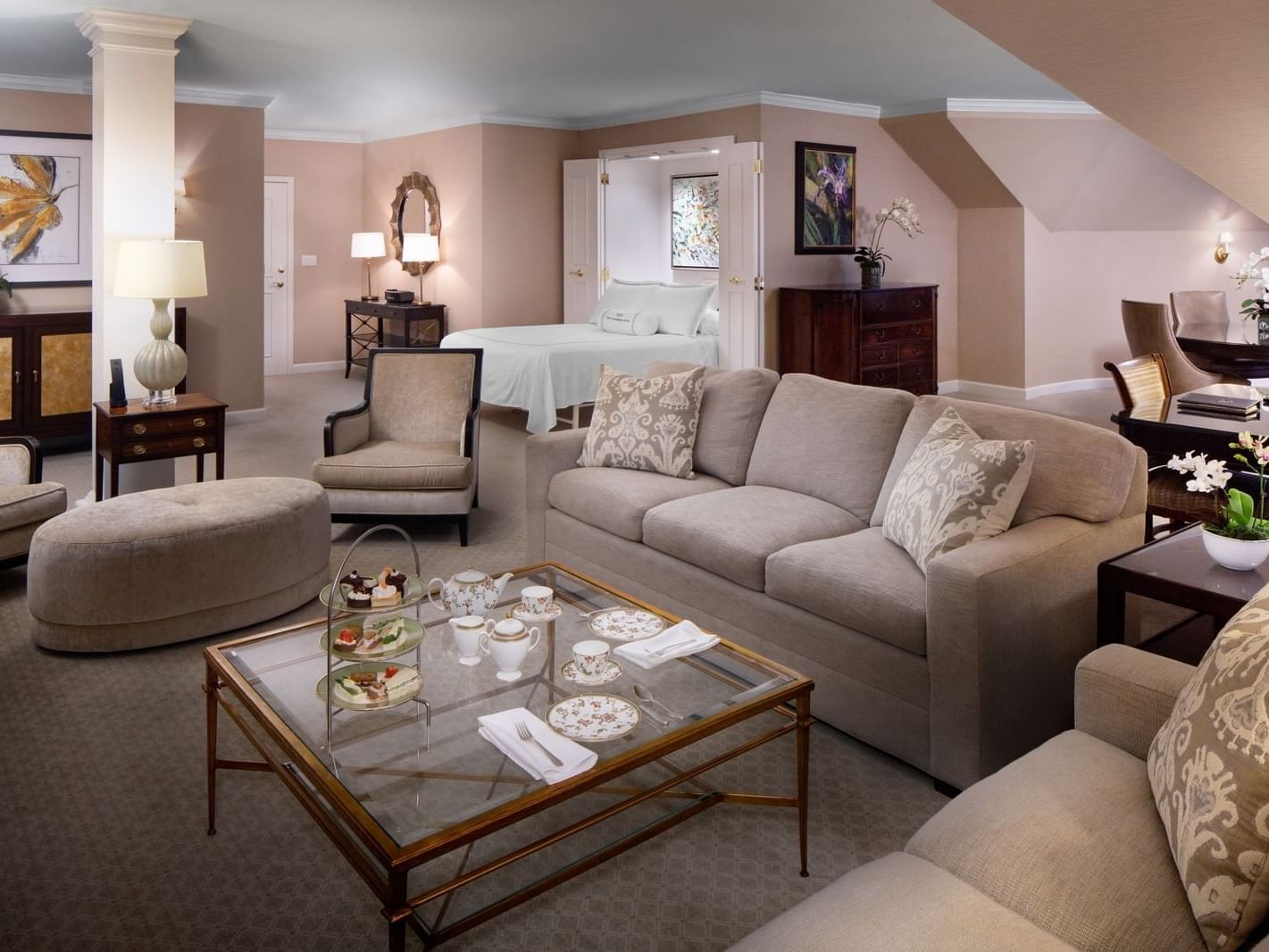 comfy couches and chairs in hotel room