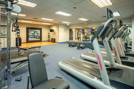 Close-up of treadmills in a fitness center at Kinzie Hotel