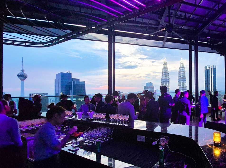 Crowded Satellite Restaurant & Bar overlooking the City at Imperial Lexis Kuala Lumpur