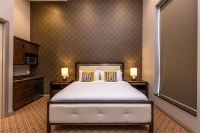 Cozy bed in King Premier Ranch at Retro Suites Hotel