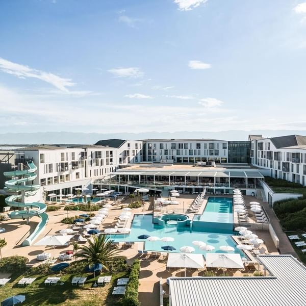 Aerial view of Falkensteiner Hotel Diadora with outdoor pools