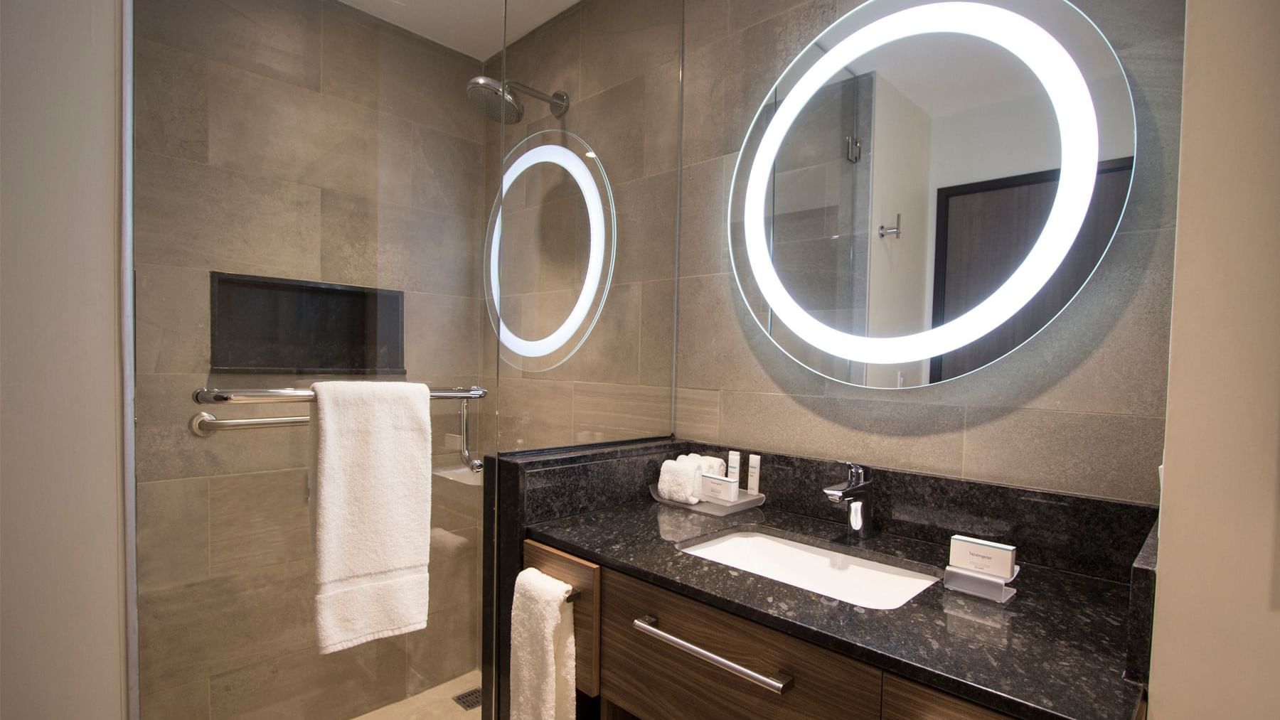 Modern bathroom sink area in Fiesta Inn Suites Aeropuerto del Bajío Silao