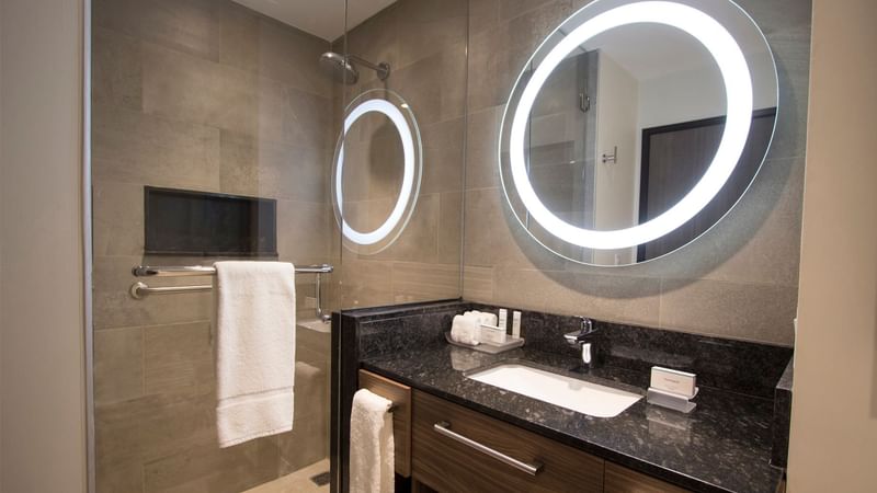 Modern bathroom sink area in Fiesta Inn Suites Aeropuerto del Bajío Silao