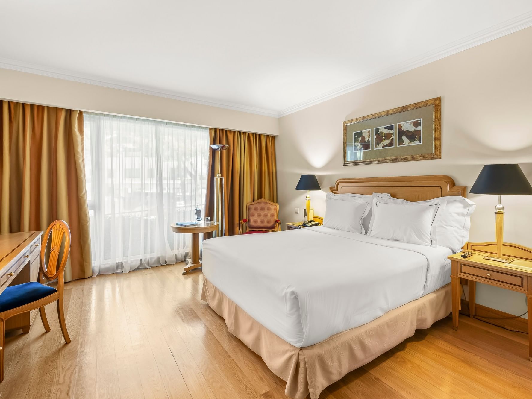 Standard room with queen bed and amenities at Hotel Cascais Miragem Health & Spa in Cascais.
