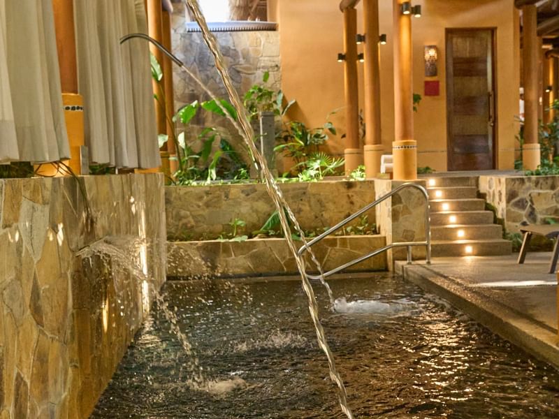 Therapeutic water feature and pool at the spa at Fiesta Americana, designed for relaxation and wellness