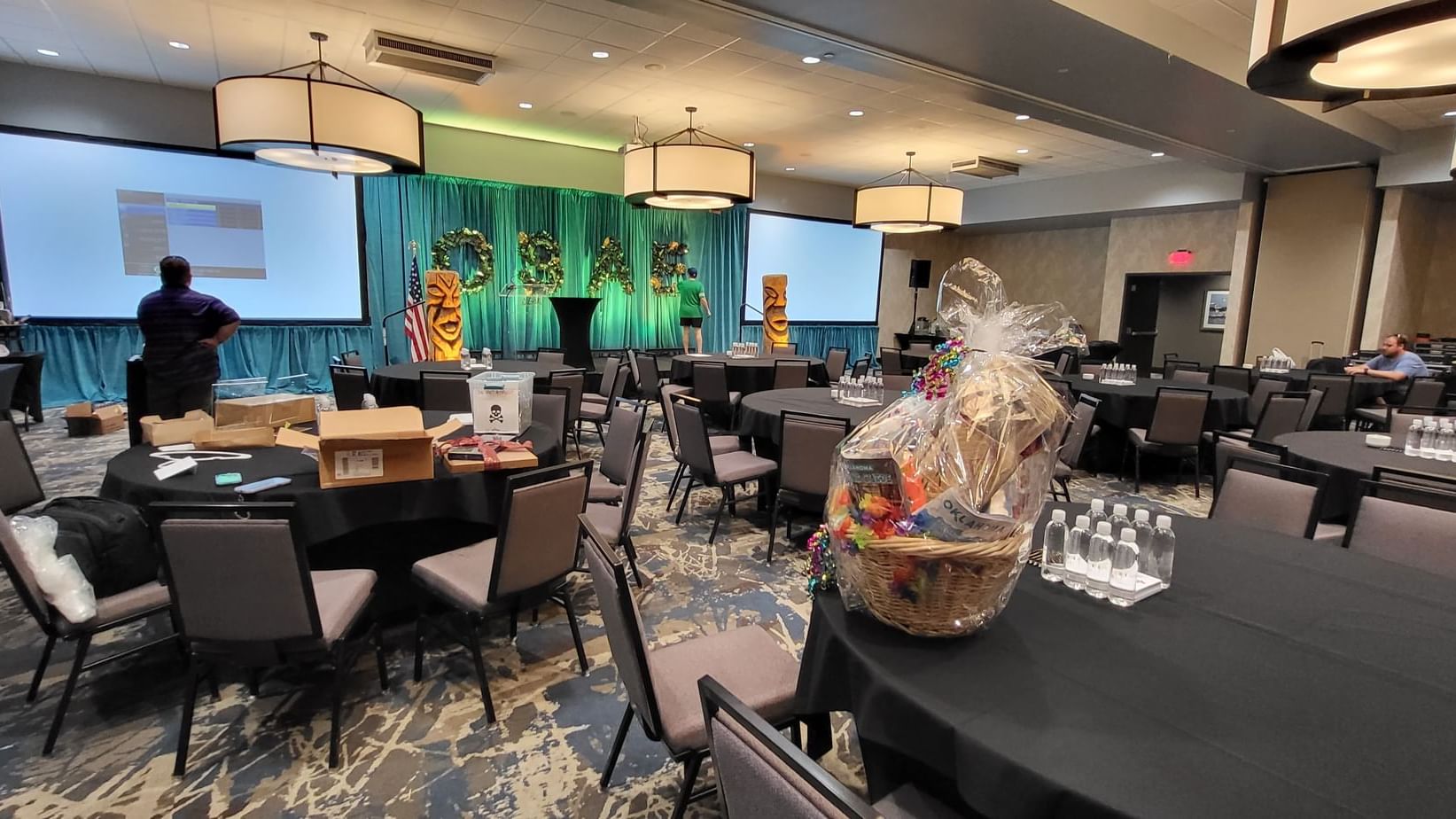 Roosevelt Ballroom set up with tables and a stage at Shangri-La Monkey Island