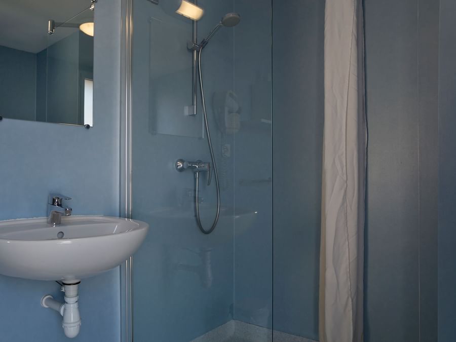 Bathroom vanity in bedrooms at Hotel Cholet Train Station