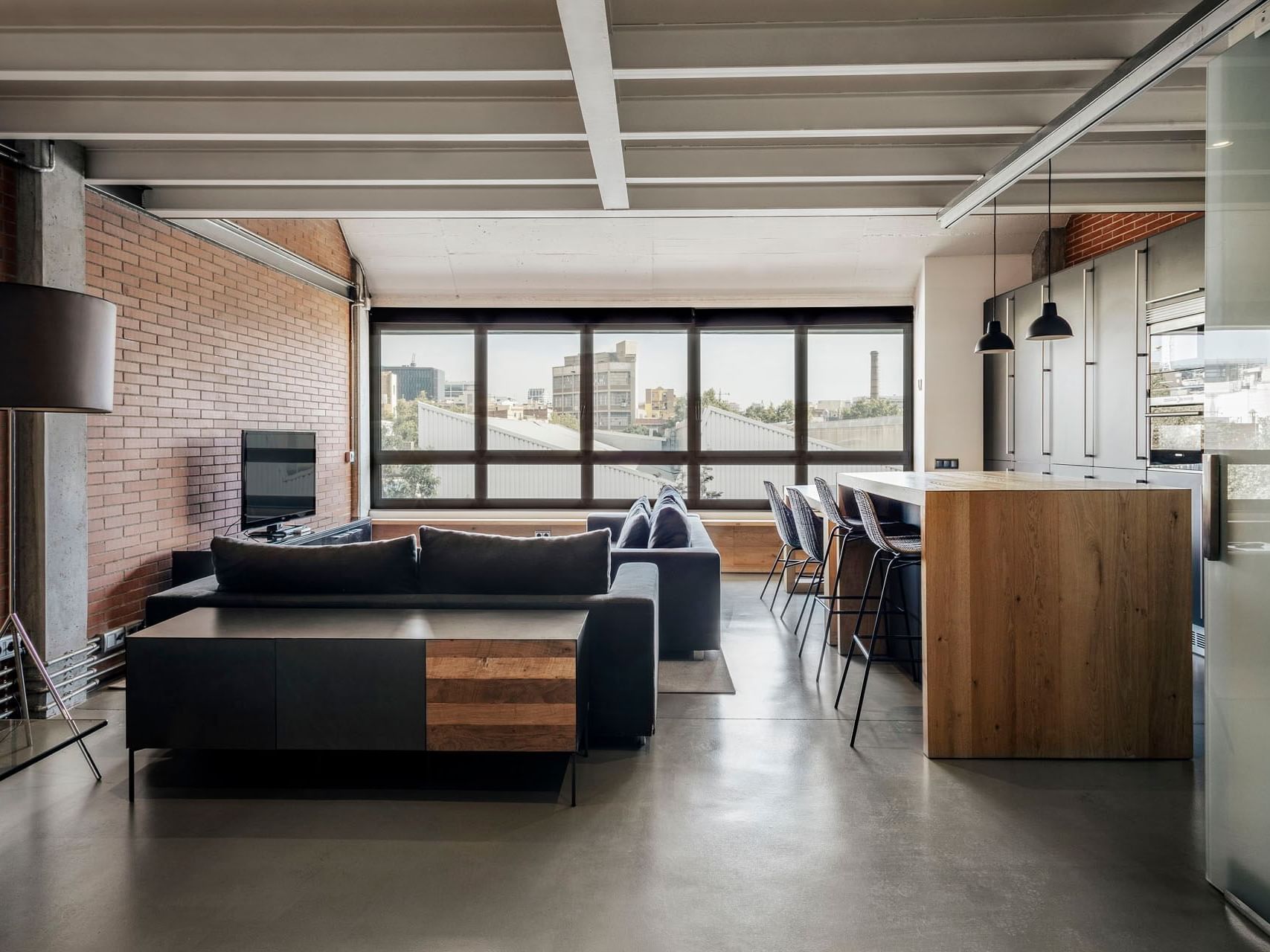 Dining & living area in Premium Suite at Barcelona Apartment