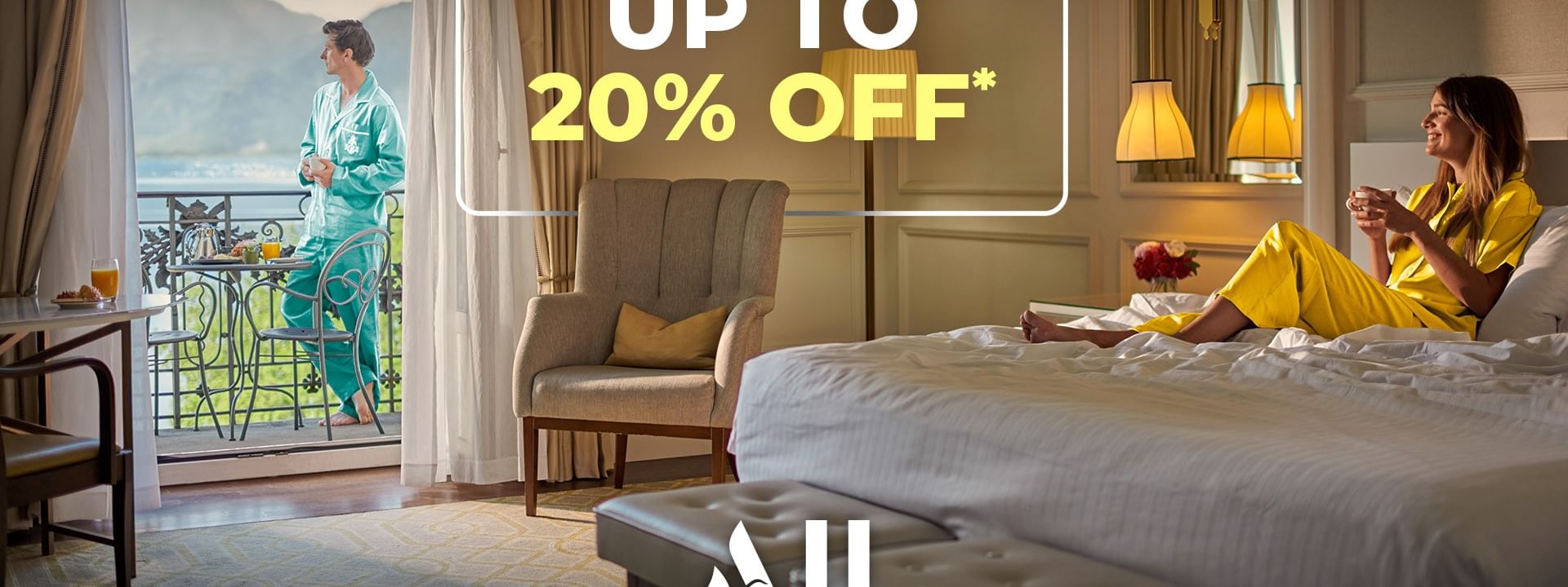 A hotel room with a woman relaxing on a bed and a man on a balcony.