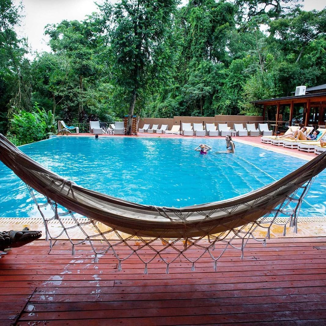Outdoor pool & hammocks at La Cantero Lodge De Selva