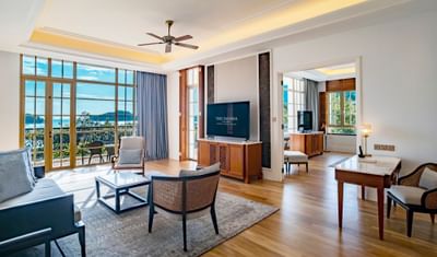Livingroom area in Countess Sea View Suite with a balcony at The Danna Langkawi