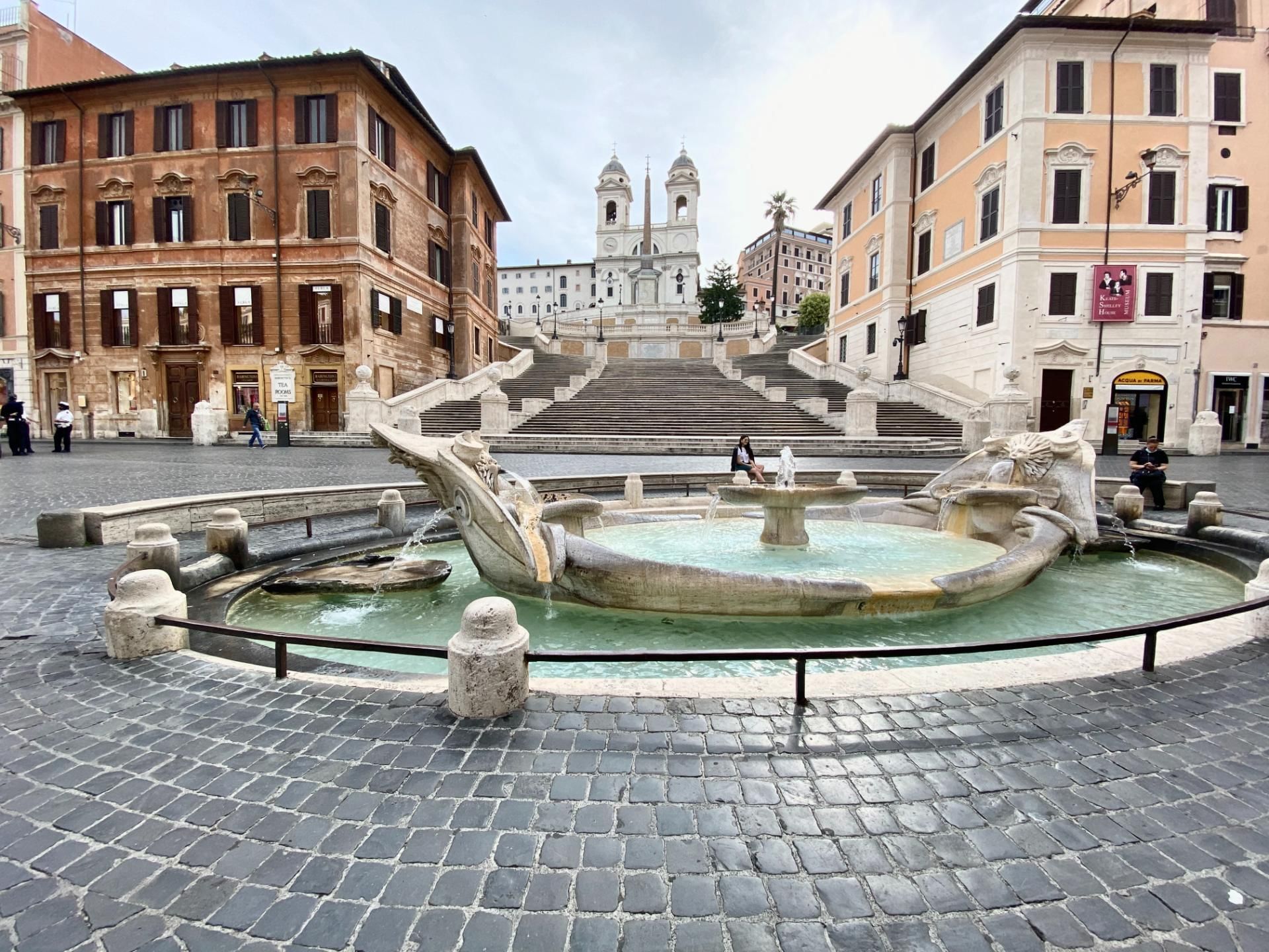 Exterior view of Fontana della Barcaccia on a sunny day near Margutta 54