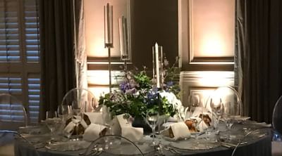 Banquet table set-up in a wedding hall at Ethan Allen Hotel