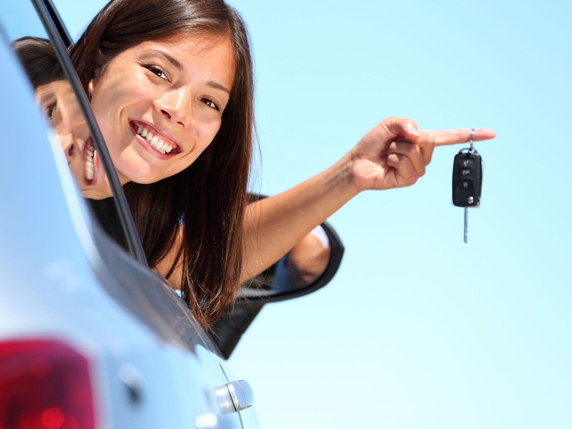 Lady holding car keys from the car at Amora Hotel Melbourne