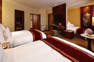 Sumaq Deluxe family room with three beds at Hotel Sumaq