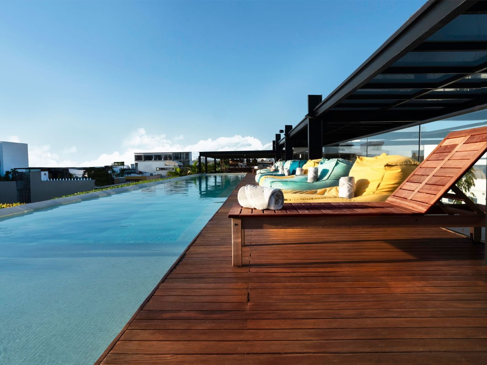 Sunbeds by the outdoor pool area at Fiesta Inn Hotels