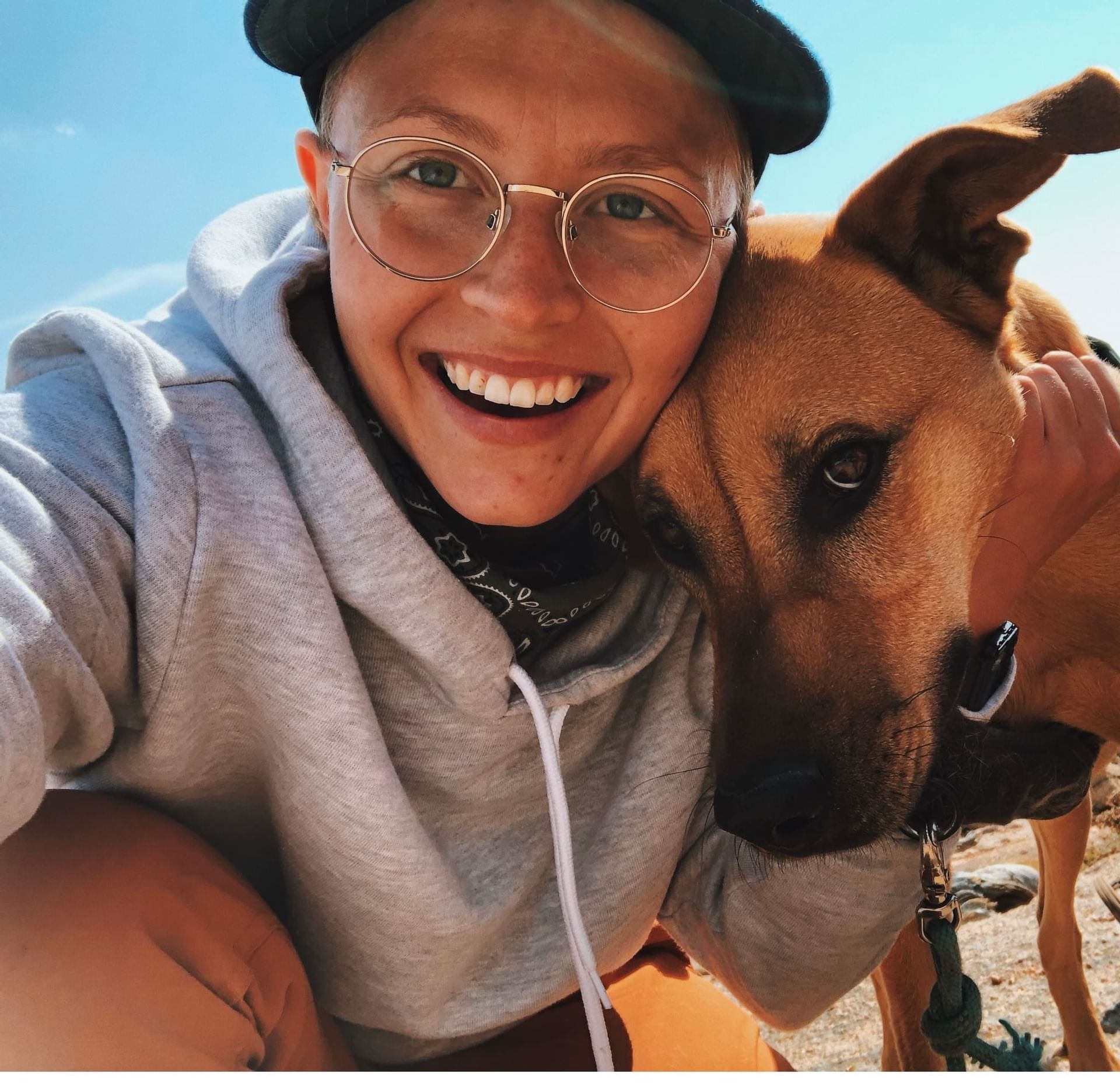 Man and a dog posing for a selfie near Kinship Landing