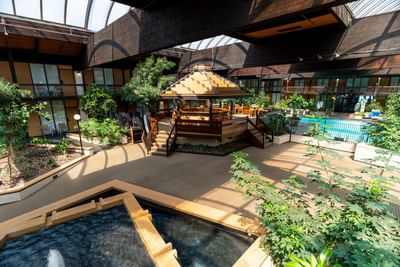 Indoor Courtyard Pool area with a Retractable Roof and Cocktail Service at M Hotel Buffalo