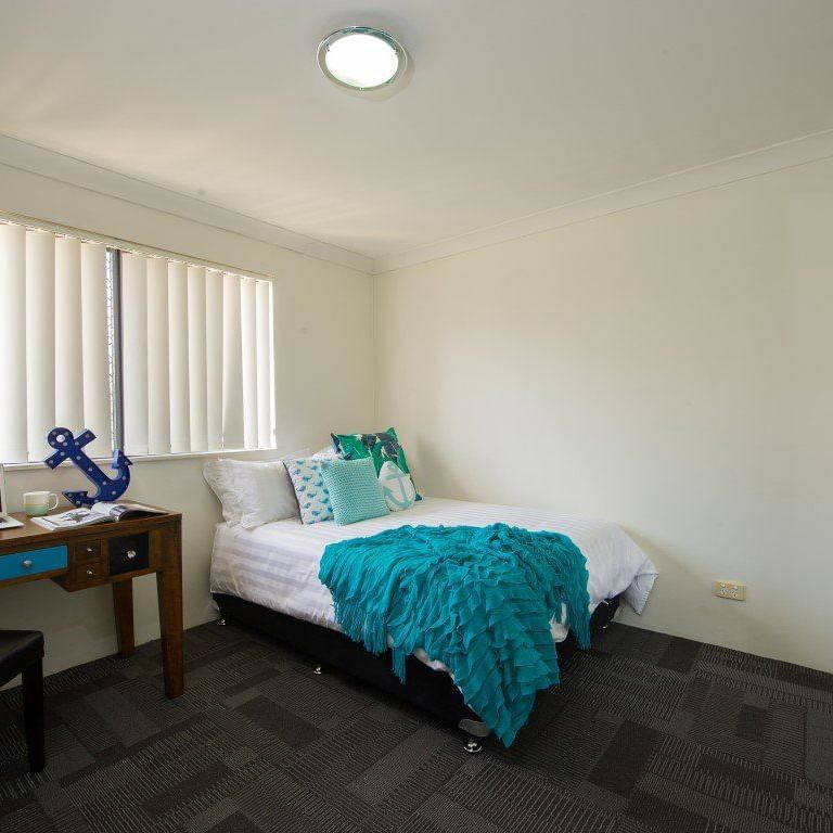 The Manors_2-Bedroom-Apartment_First-bedroom-with-study-desk