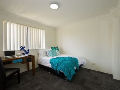 The Manors_2-Bedroom-Apartment_First-bedroom-with-study-desk