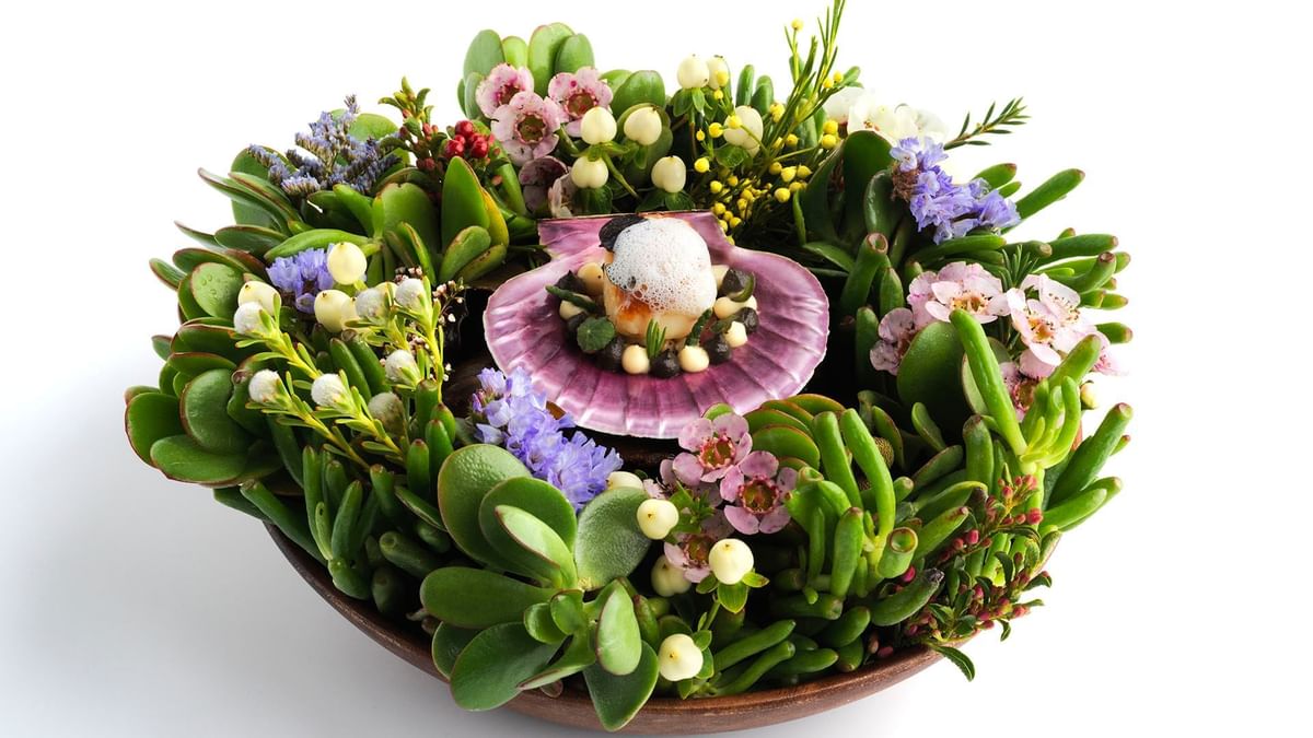 Floral arrangement with green succulents in Oncore by Clare Smyth at Crown Towers Sydney