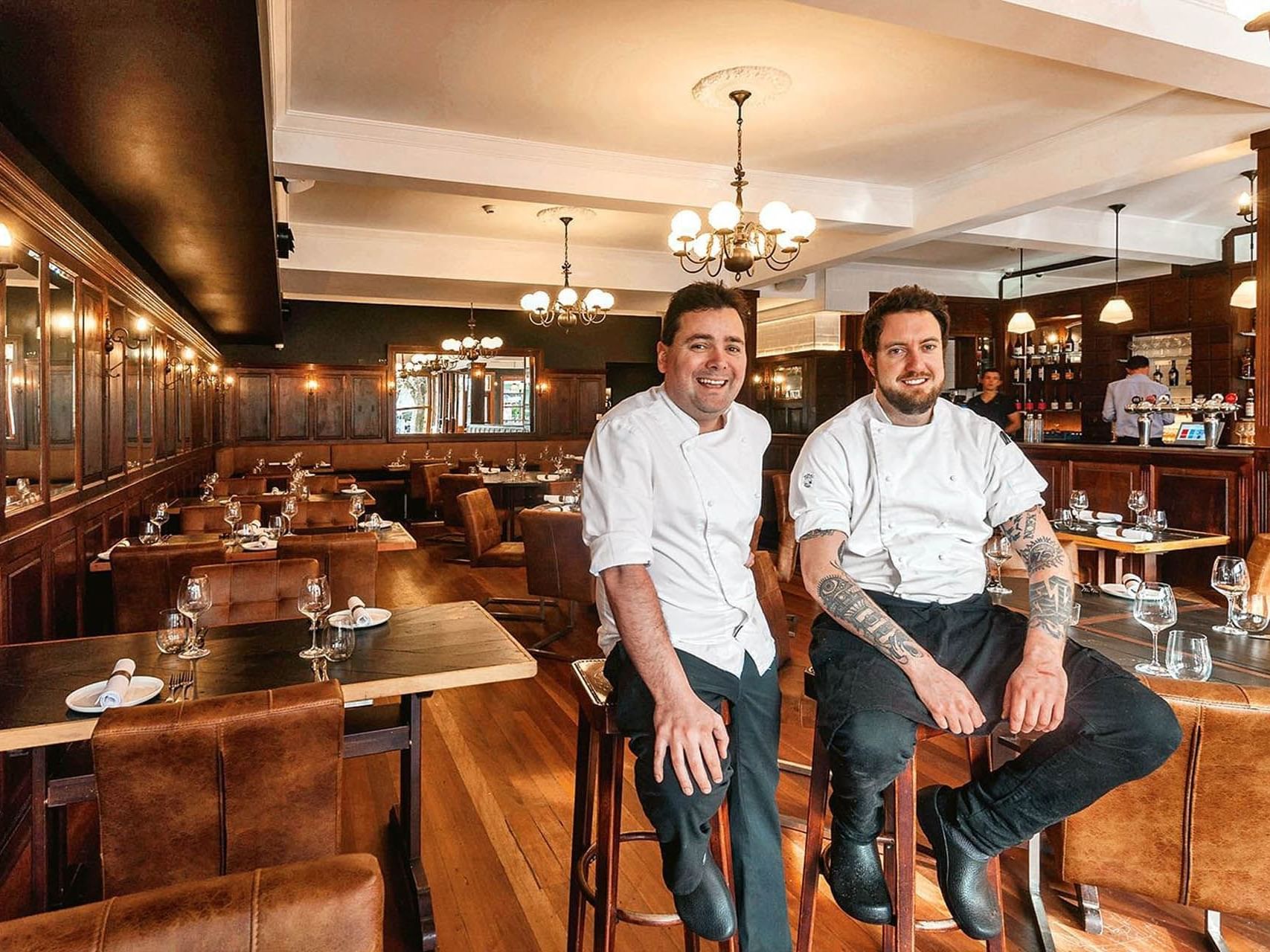 Chefs on stools in Otis Kingston near Hotel Knightsbridge