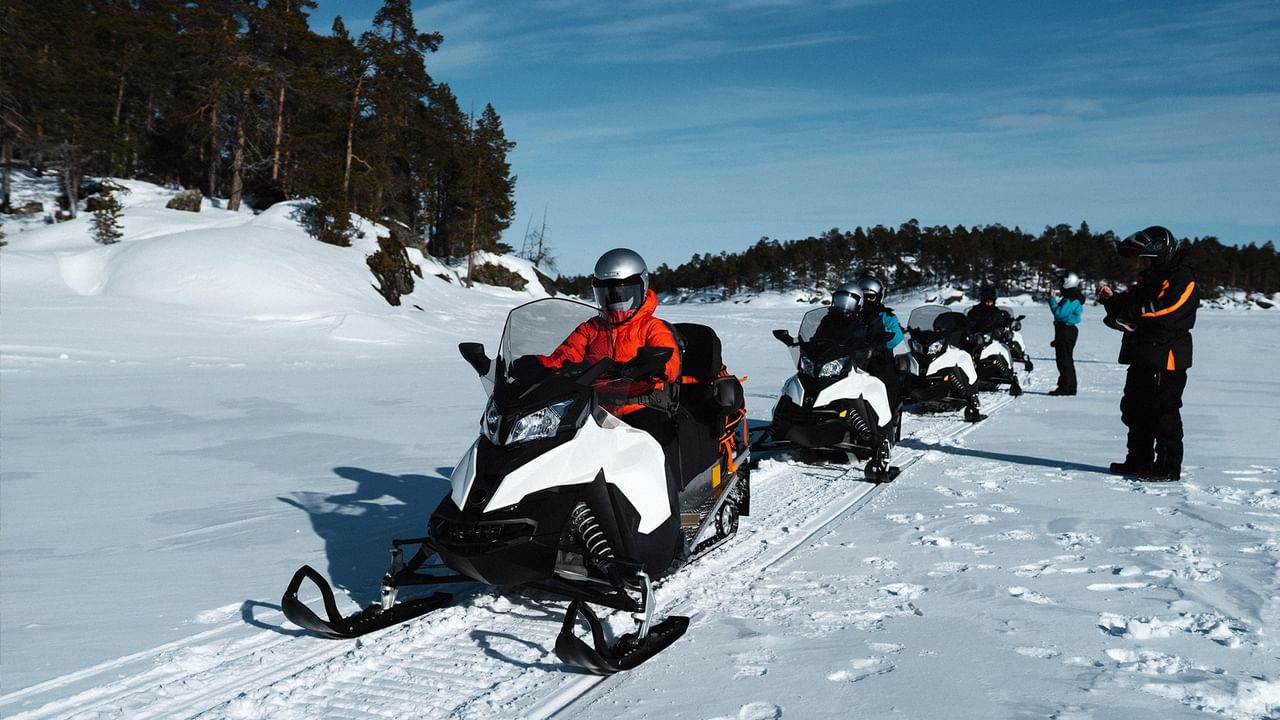 Group of snowmobile riders on the Golden Triangle Trail System.