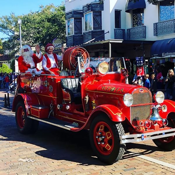 Christmas decorated vehicle at Resort Winter Park Christmas Parade near Lake Buena Vista Resort Village & Spa