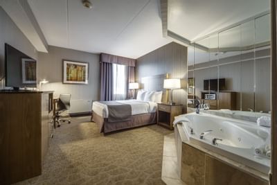 Double bed with Flat tv, safe and Jacuzzi - Monte Carlo Inn Airp