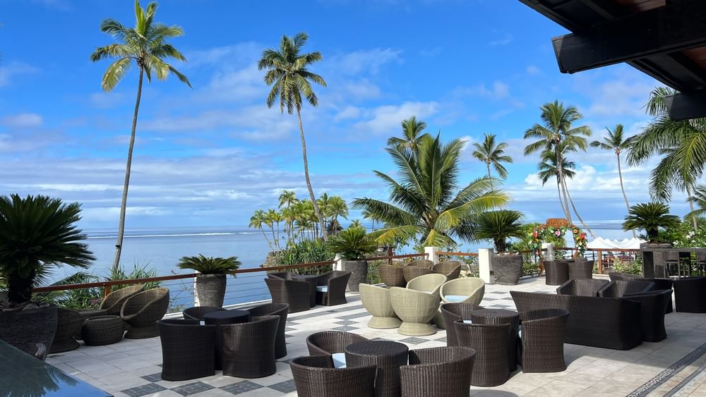Sunset Terrace Bar at Warwick Fiji Resort and Spa, Korolevu, with ocean view and tropical decor.