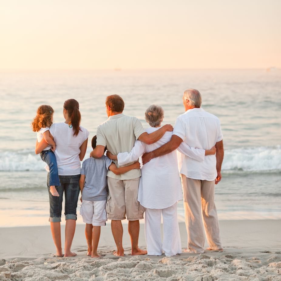 Multigenerational Family on the beach at dusk at ICONA Cape May