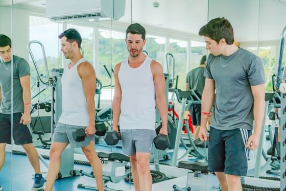Instructor and a guest in the gym at Retreat Costa Rica