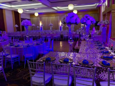 Event space with tables, cutlery & chairs, Pegasus Hotel Guyana