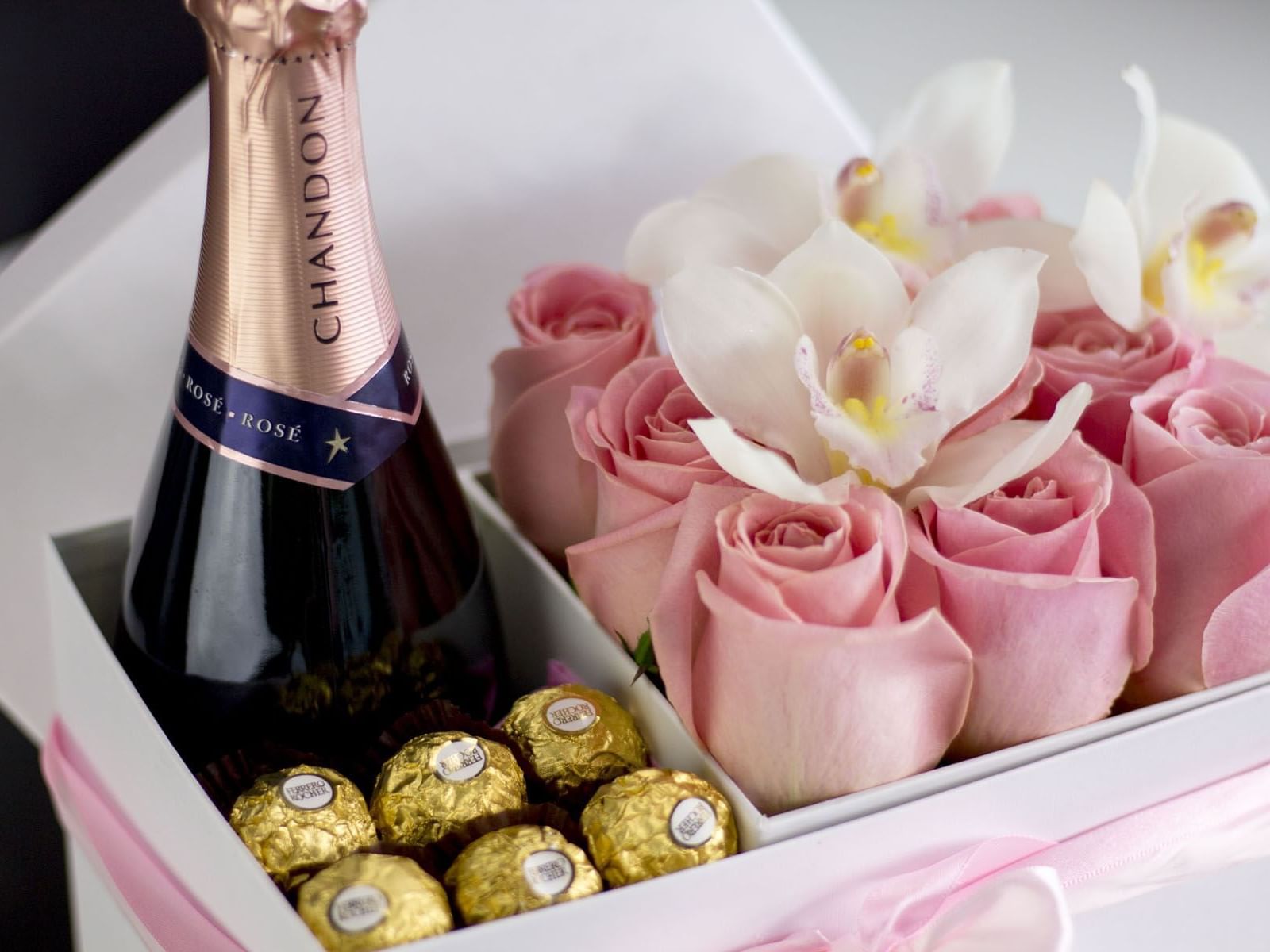 box of Champaign pink roses & chocolate at The Inn of Waterloo