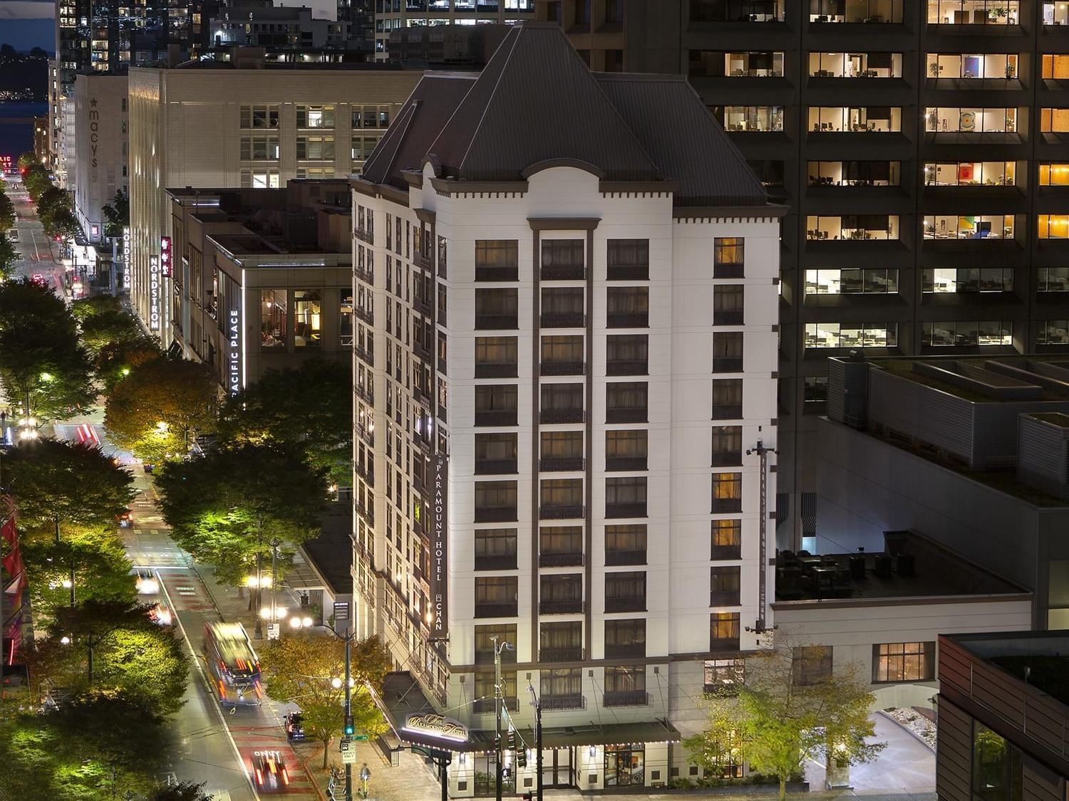 Aerial view of the hotel exterior & busy streets at night in Paramount Hotel Seattle