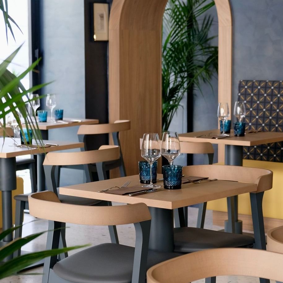 Da Mariolino Restaurant arranged with wine glasses and cutleries at Mario de’ Fiori 37